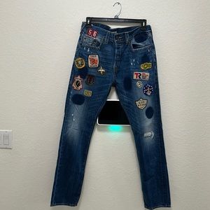 True religion men’s jeans dean tapered with multiple patches. Size 33.
